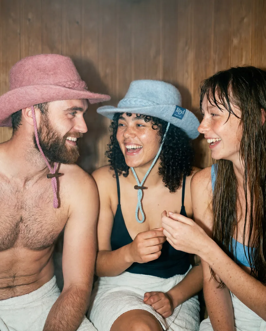 löyl wool felt cowboy sauna hat, naturally dyed, worn in a sauna