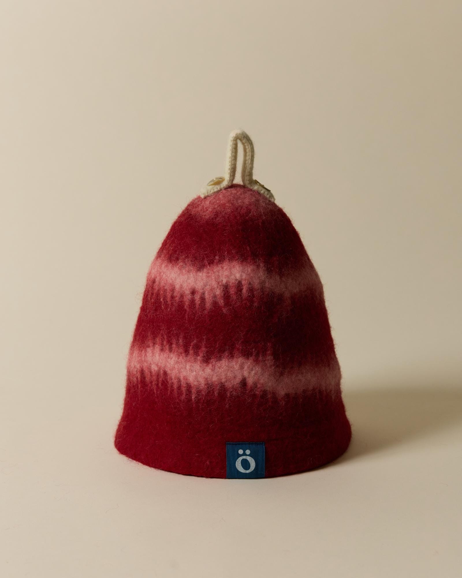 löyl bloom in ember, straight on, with the ö label at the front